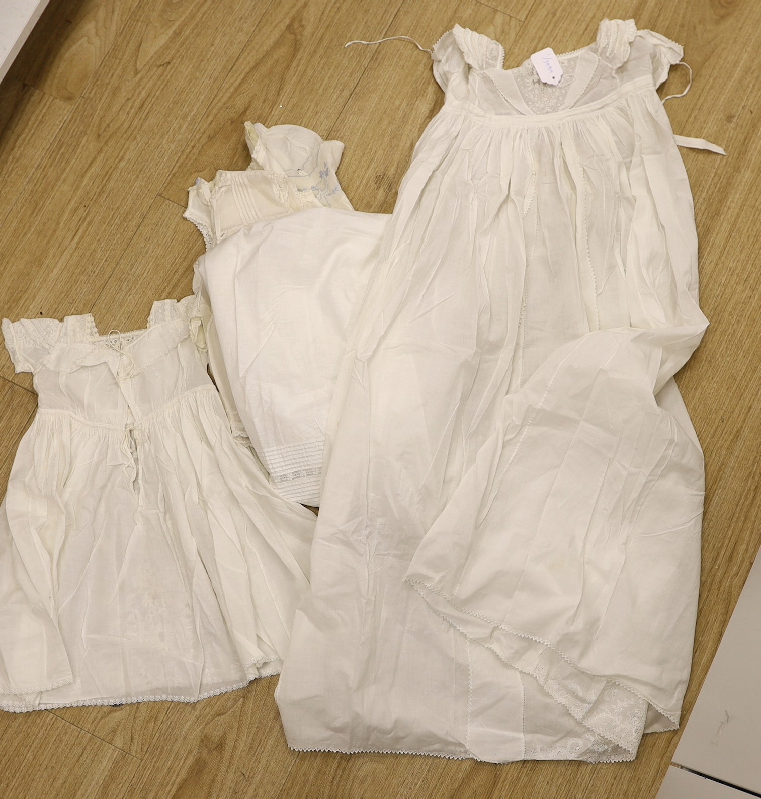 A 19th century Scottish Ayrshire, hand white worked christening gown and a similar baby dress, together with a collection of other 19 th century baby wear.